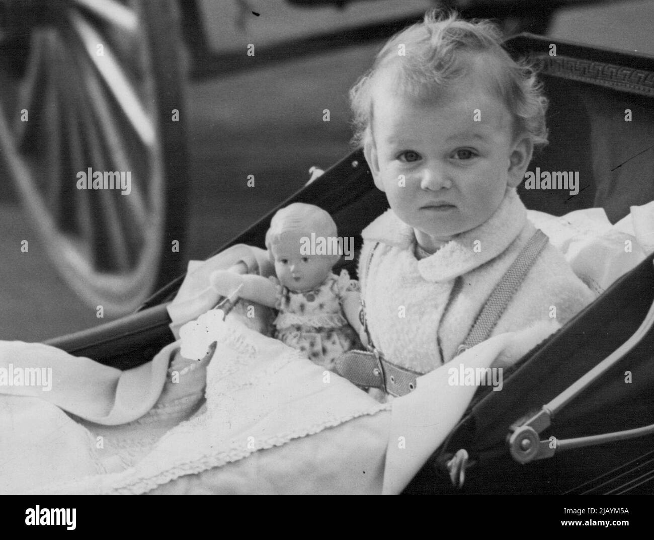 Prince Edward and Princess Alexandra, children of The Duke and Duchess of Kent, were taken out to get the benifit of a nice spring morning, in Belgrave Square. Princess Alexandra in her Pram in Belgrave Square, this morning. February 03, 1938. (Photo by Sport & General Press Agency Limited) Stock Photo