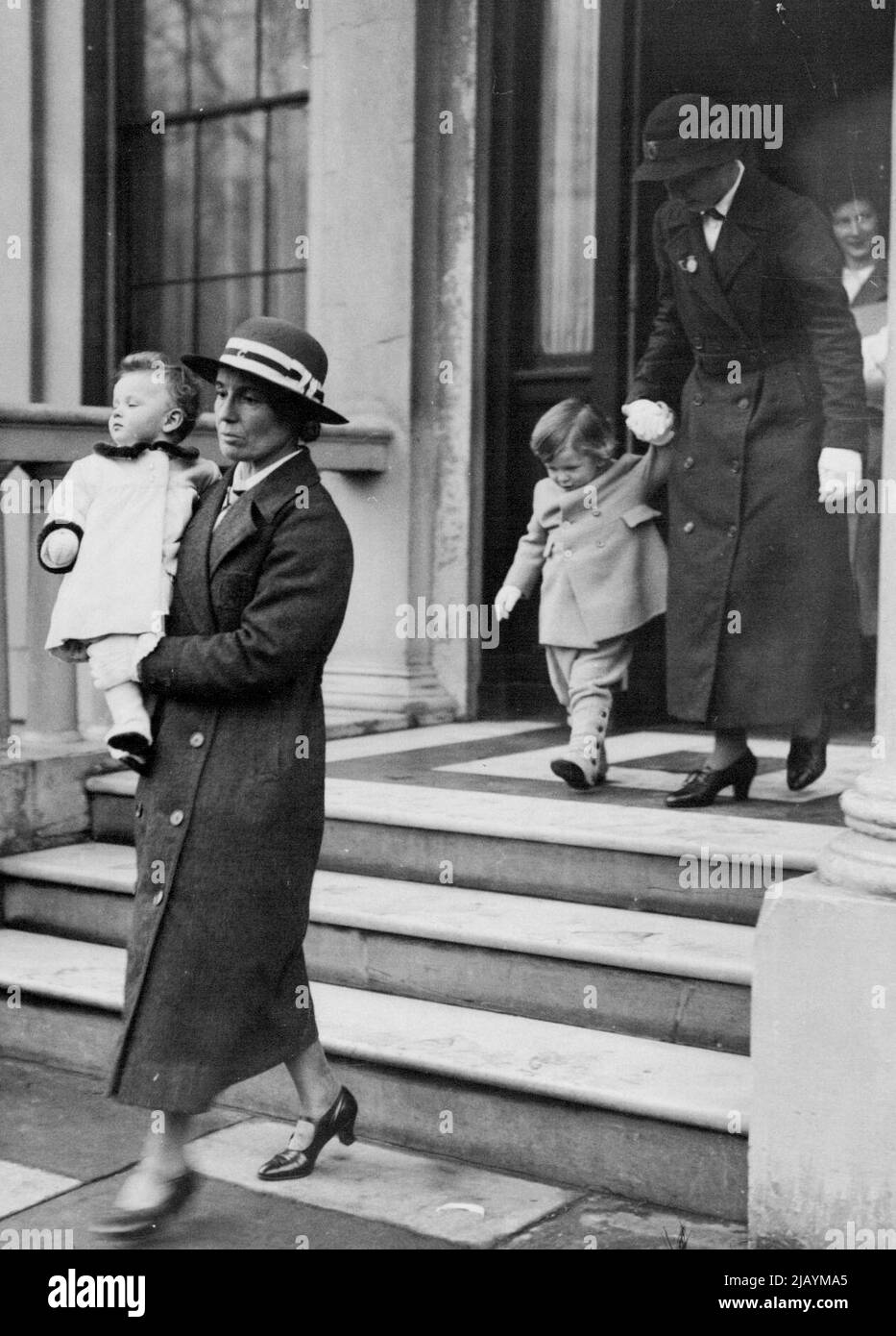 Royal Children Leave for Xmas Holiday -- Princess Alexandra and her brother, Prince Edward, leaving Belgrave Square for Sandringham, where they will spend the Christmas with the King and Queen and other members of the Royal Family. January 10, 1938. (Photo by Central Press Photos Ltd.) Stock Photo