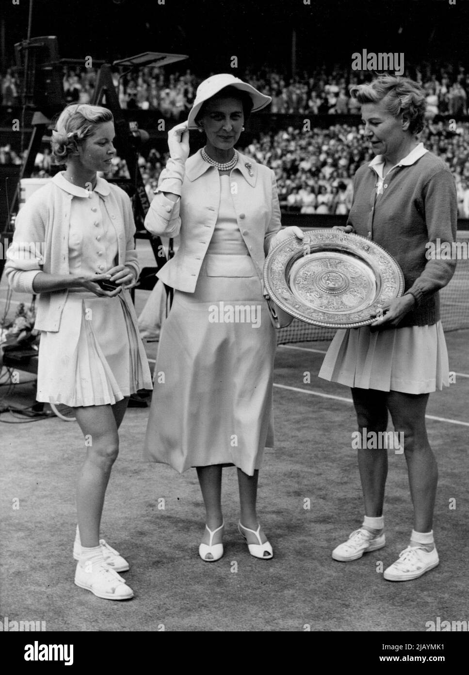Royal Presentation - HRH The Duchess of Kent presents the singles trophy to Louise Brough. On left is Mrs. Beverley Fleitz. Louise Brough (USA) won the Wimbledon ingles titles for the fourth time today when she beat fellow country woman, Mrs. Beverley Baker Fleitz. July 02, 1955. (Photo by Paul Popper, Paul Popper Ltd.). Stock Photo