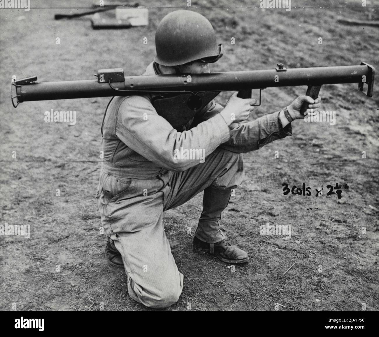 The Armor-Piercing 'Bazooka' -- Correct way to fire the gun. Operated in North Africa and Sicily with deadly effect against Nazi tanks. August 12, 1944. (Photo by The New York Times). Stock Photo