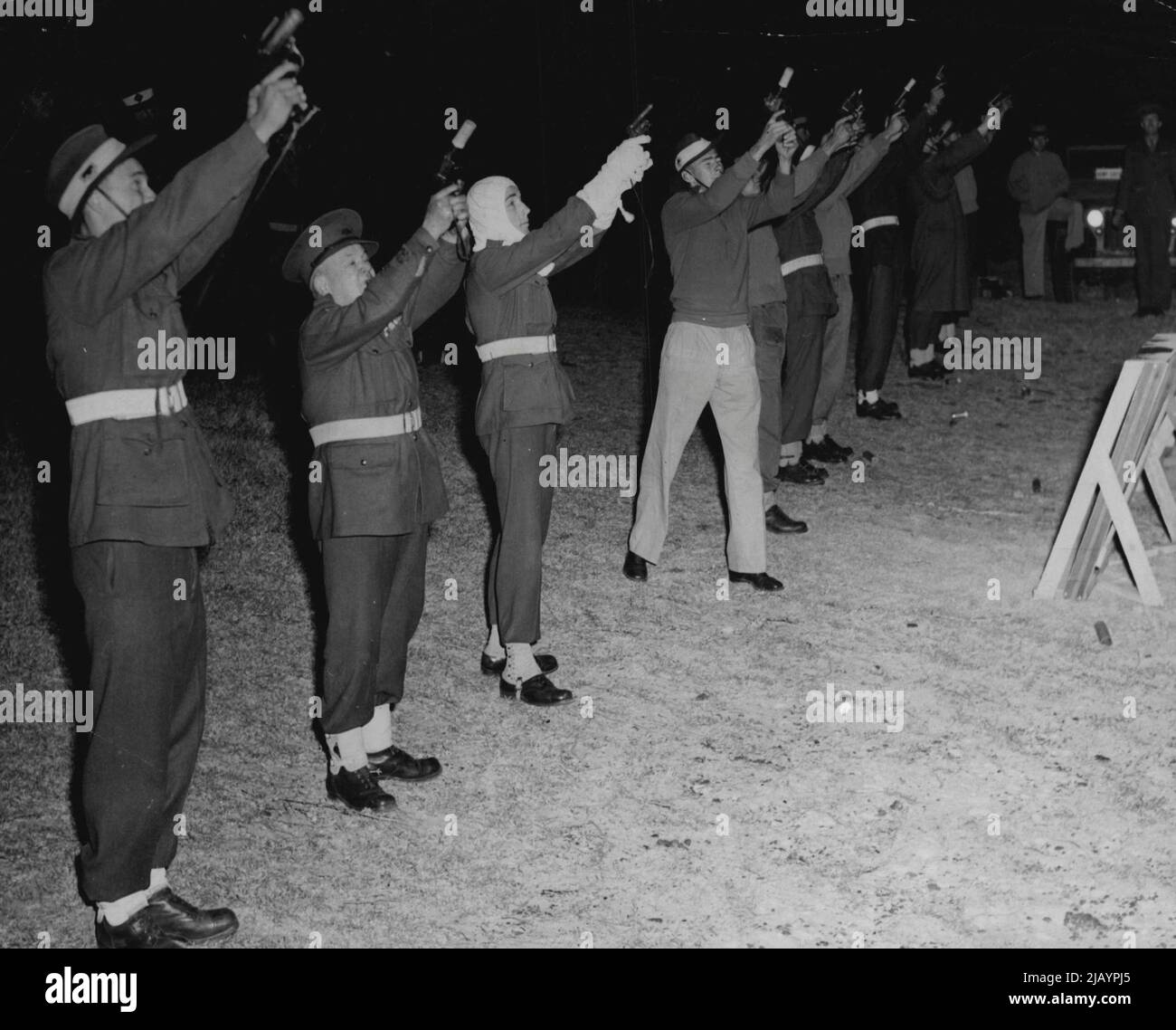 Army personal being trained in the use of Verey Pistols in preparation for the 2nd security hear aerobic carnival in farm cave on Nov 2. October 29, 1946. Stock Photo