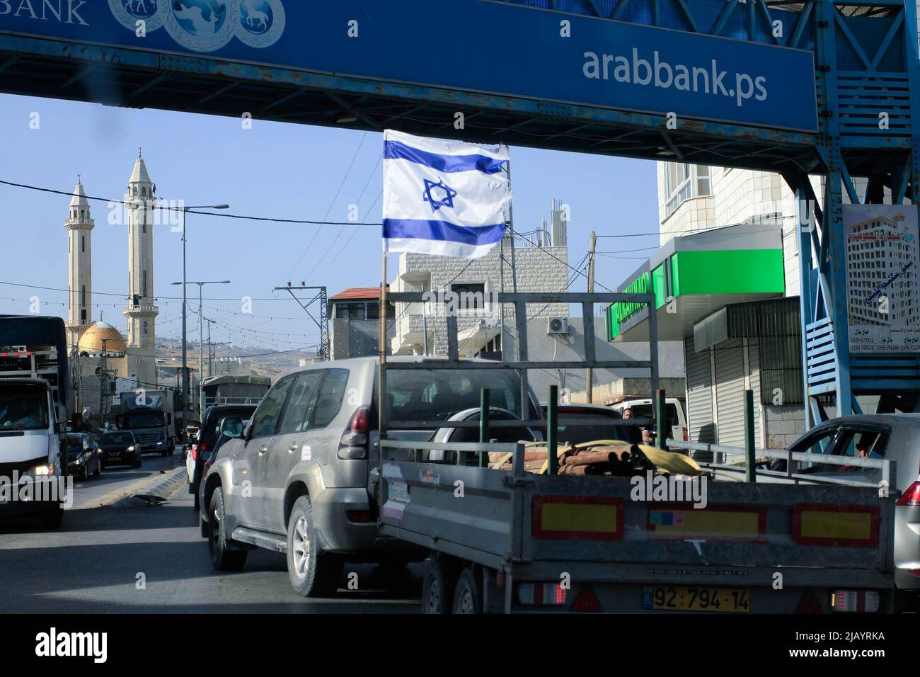 Nablus, West Bank, Palestine. 27th May, 2022. A Jewish settler seen hanging an Israeli flag on his car while driving through the town of Hawara, south of the city of Nablus in the West Bank. (Credit Image: © Nasser Ishtayeh/SOPA Images via ZUMA Press Wire) Stock Photo