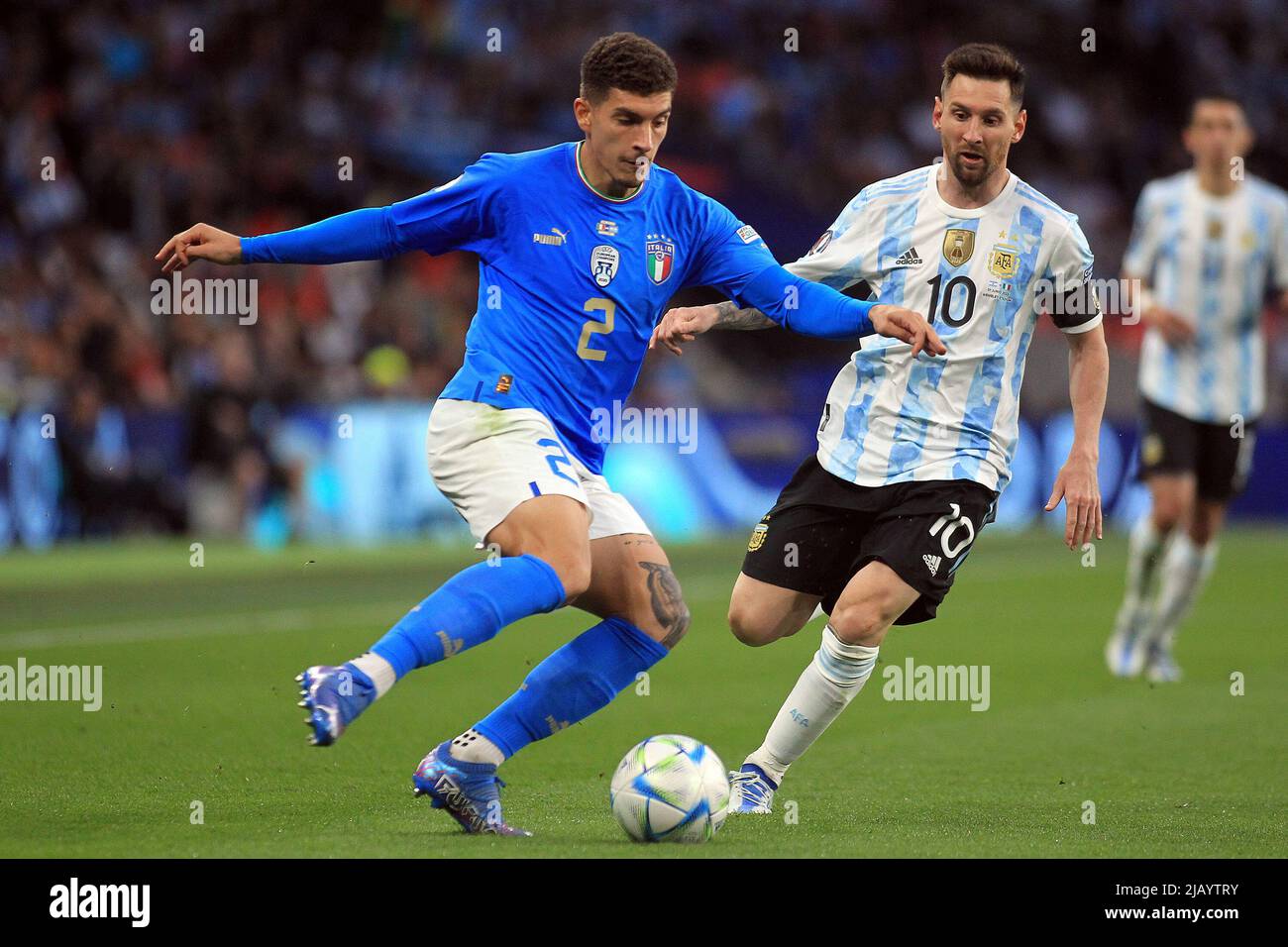 London, UK. 01st June, 2022. Giovanni Di Lorenzo of Italy (L) in action with Lionel Messi of Argentina (R). Finalissima 2022 match, Italy v Argentina at Wembley Stadium in London on Wednesday 1st June 2022. Editorial use only. pic by Steffan Bowen/Andrew Orchard sports photography/Alamy Live news Credit: Andrew Orchard sports photography/Alamy Live News Stock Photo