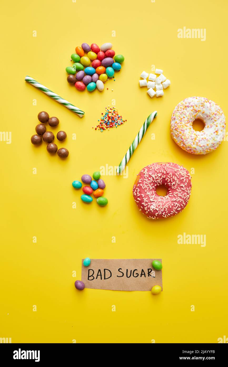 Bad sugar concept various unhealthy sweets such as doughnuts