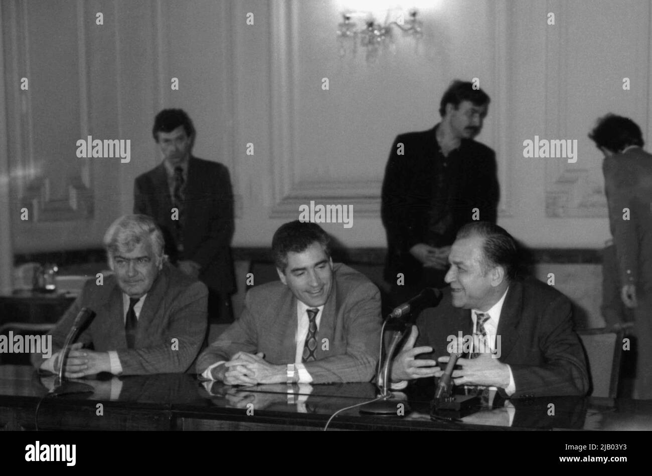Bucharest, Romania, 1990. The President of the Romanian Football Federation, Mircea Angelescu, with politicians Petre Roman & Ion Iliescu, during a press conference following the qualification of the national football team to the 1990 FIFA World Cup. Stock Photo