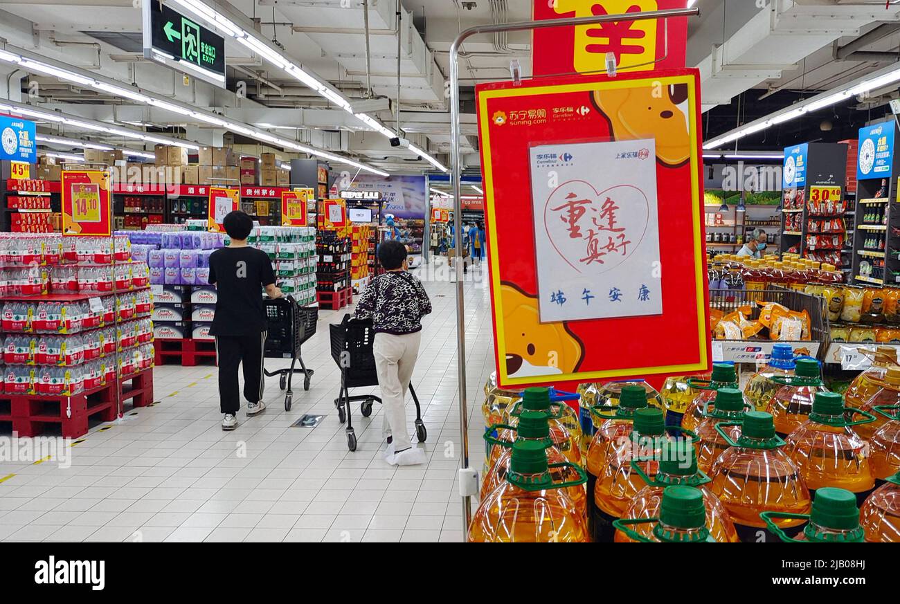 SHANGHAI, CHINA JUNE 1, 2022 Citizens shop at a Carrefour