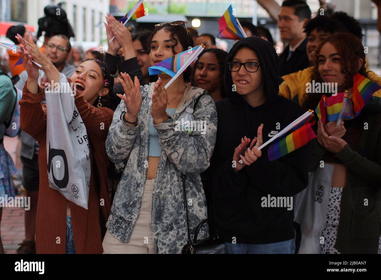 Alyssa Pizzuto, Milvia Guzman and Ashley Bencosme cheer during the City of Boston's Pride Kickoff event, celebrating the start of National LGBTQ+ Pride Month, in Boston, Massachusetts, U.S., June 1, 2022.   REUTERS/Brian Snyder Stock Photo