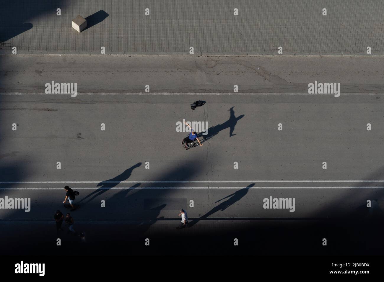 Barcelona, Barcelona, Spain. 1st June, 2022. A man in a wheelchair seen from a tower of the