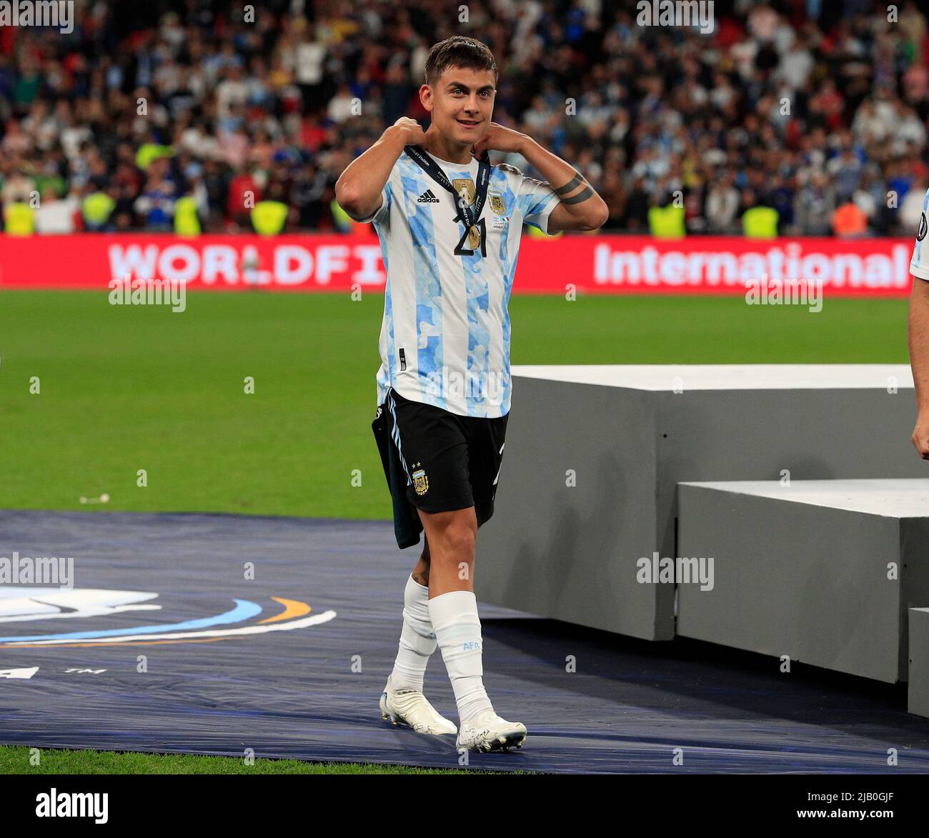 1st June 2022;  Wembley Stadium, London, England : CONBEMOL-UEFA CHAMPIONS CUP - FINALISSIMA, Italy versus Argentina:  Paulo Dybala of Argentina with a winners medal Stock Photo
