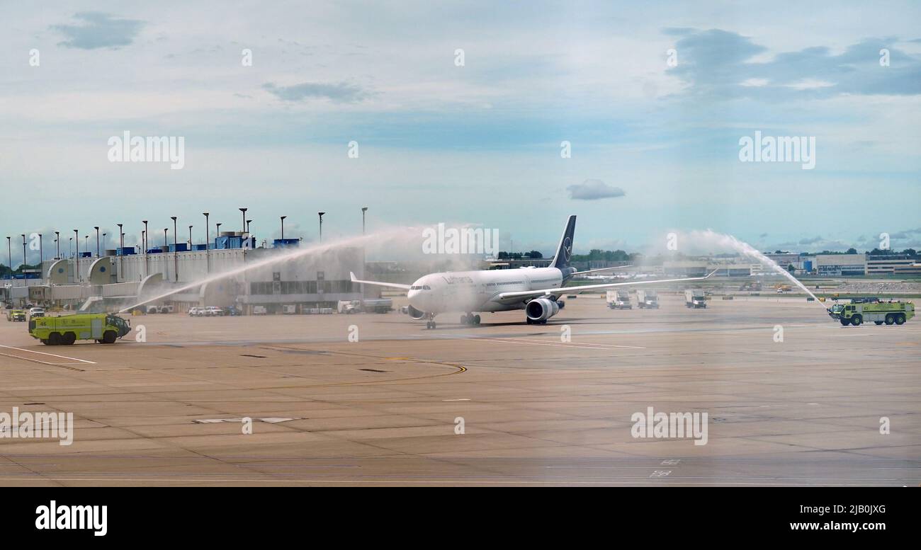 St. Louis, United States. 01st June, 2022. A Lufthansa Airbus A330-300 is greeted by a water canon from a St. Louis Fire Department fire truck upon arrival at St. Louis-Lambert International Airport in St. Louis on Wednesday, June 1, 2022. Lufthansa has begun non-stop service between St. Louis and Frankfort, Germany three times a week. St. Louis has not seen International flights since 2003. Photo by Bill Greenblatt/UPI Credit: UPI/Alamy Live News Stock Photo