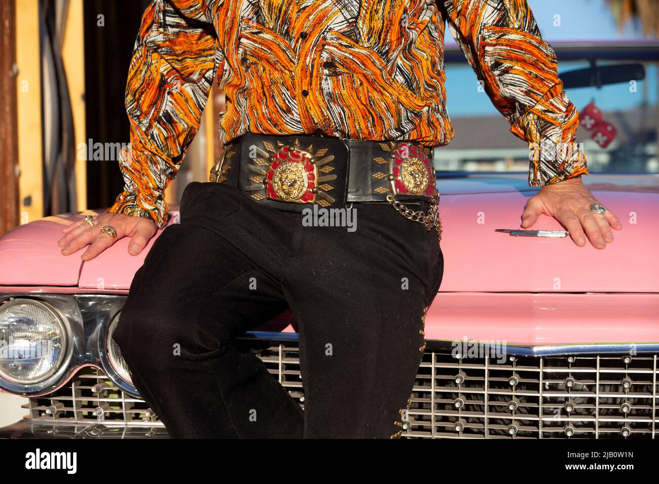 A detail view as Elvis Presley tribute artist Jesse Garon poses in front of his 1960 Cadillac convertible after a marriage vow renewal ceremony at Little Chapel of Hearts in Las Vegas, Nevada, U.S. June 1, 2022.  REUTERS/Steve Marcus Stock Photo
