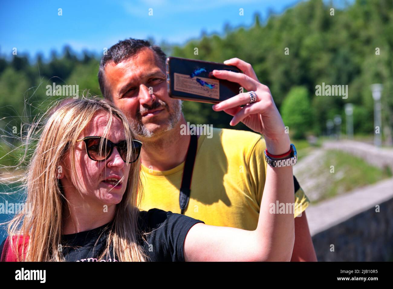 Smart couple holding hands hi-res stock photography and images - Alamy