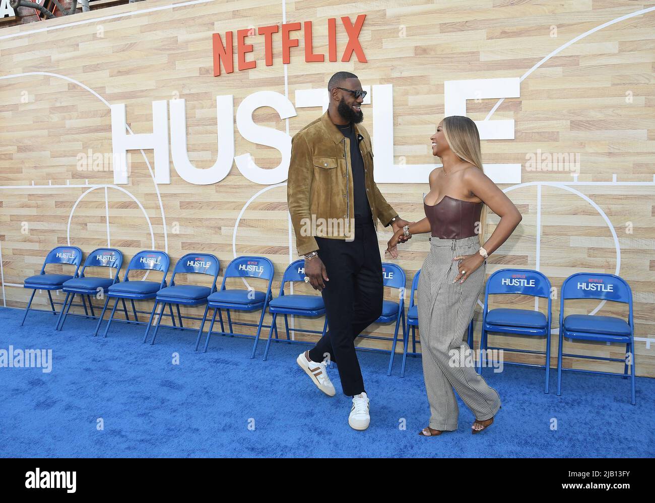 (L-R) LeBron James and Savannah James arrives at Netflix's HUSTLE Los ...