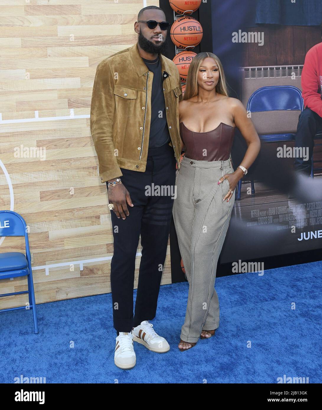 (L-R) LeBron James and Savannah James arrives at Netflix's HUSTLE Los ...