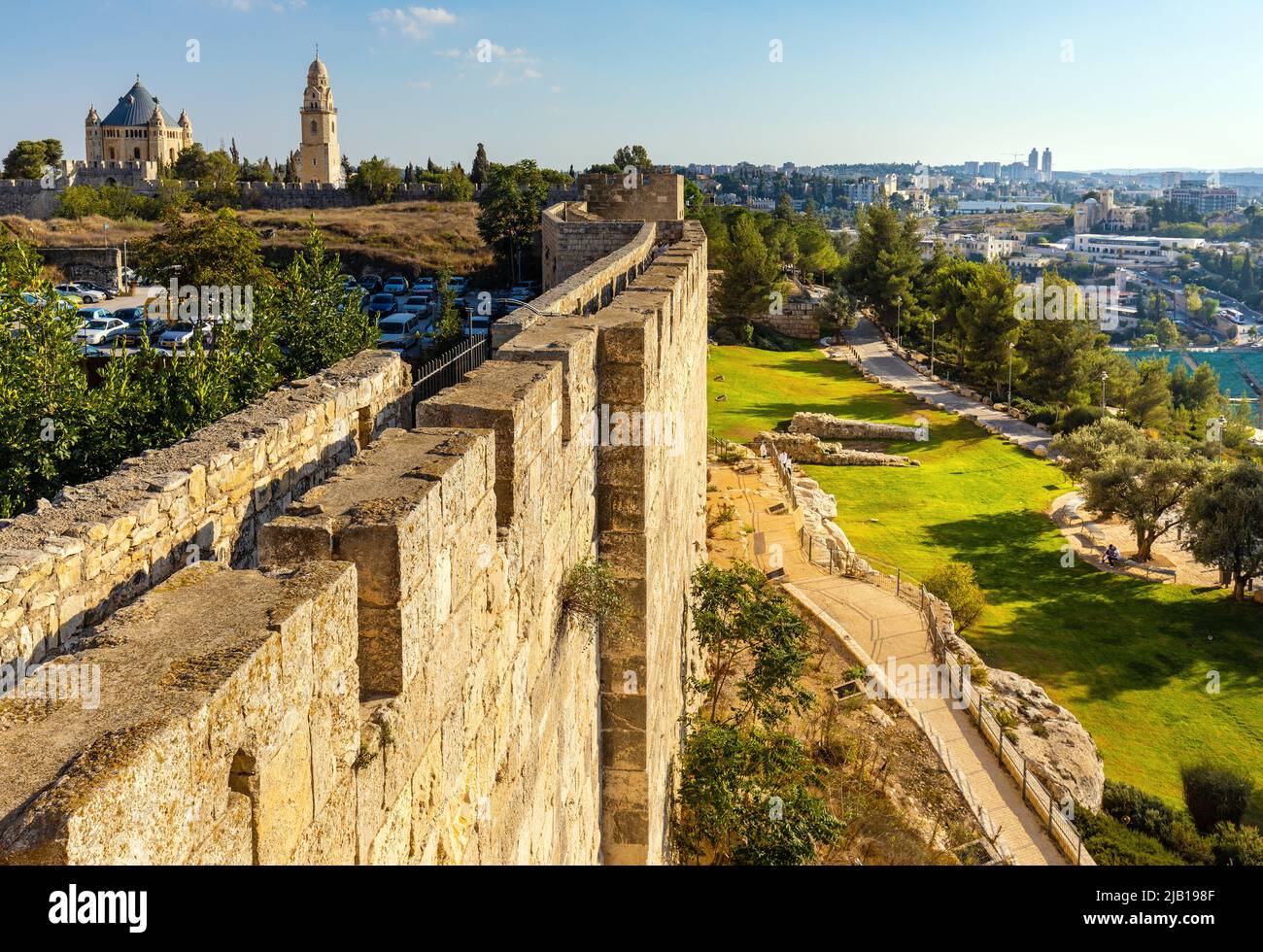 Jerusalem, Israel - October 12, 2017: Walls of Old City over Hativat Yerushalayim street with Armenian quarter of Jerusalem Stock Photo