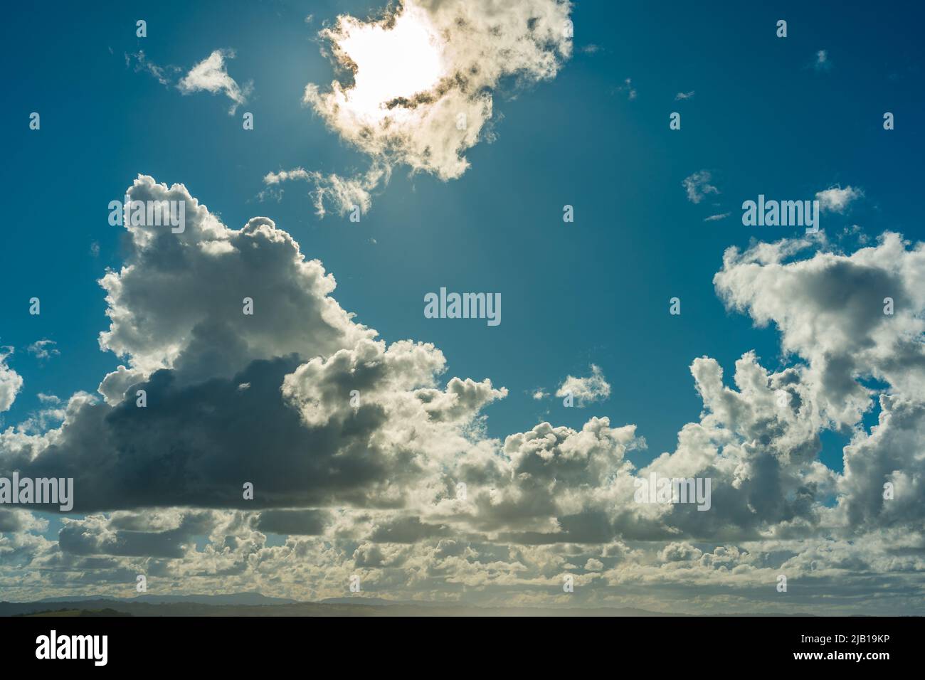 Dark clouds in a blue sky Stock Photo