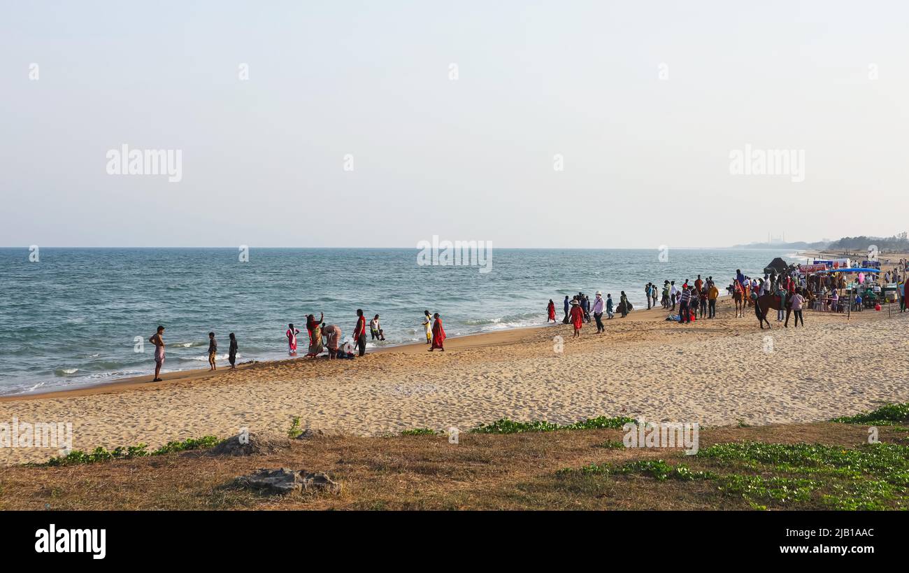 INDIA, TAMILNADU, MAHABALIPURAM, March 2022,Tourist at pilgrimage Beach during evening Stock Photo