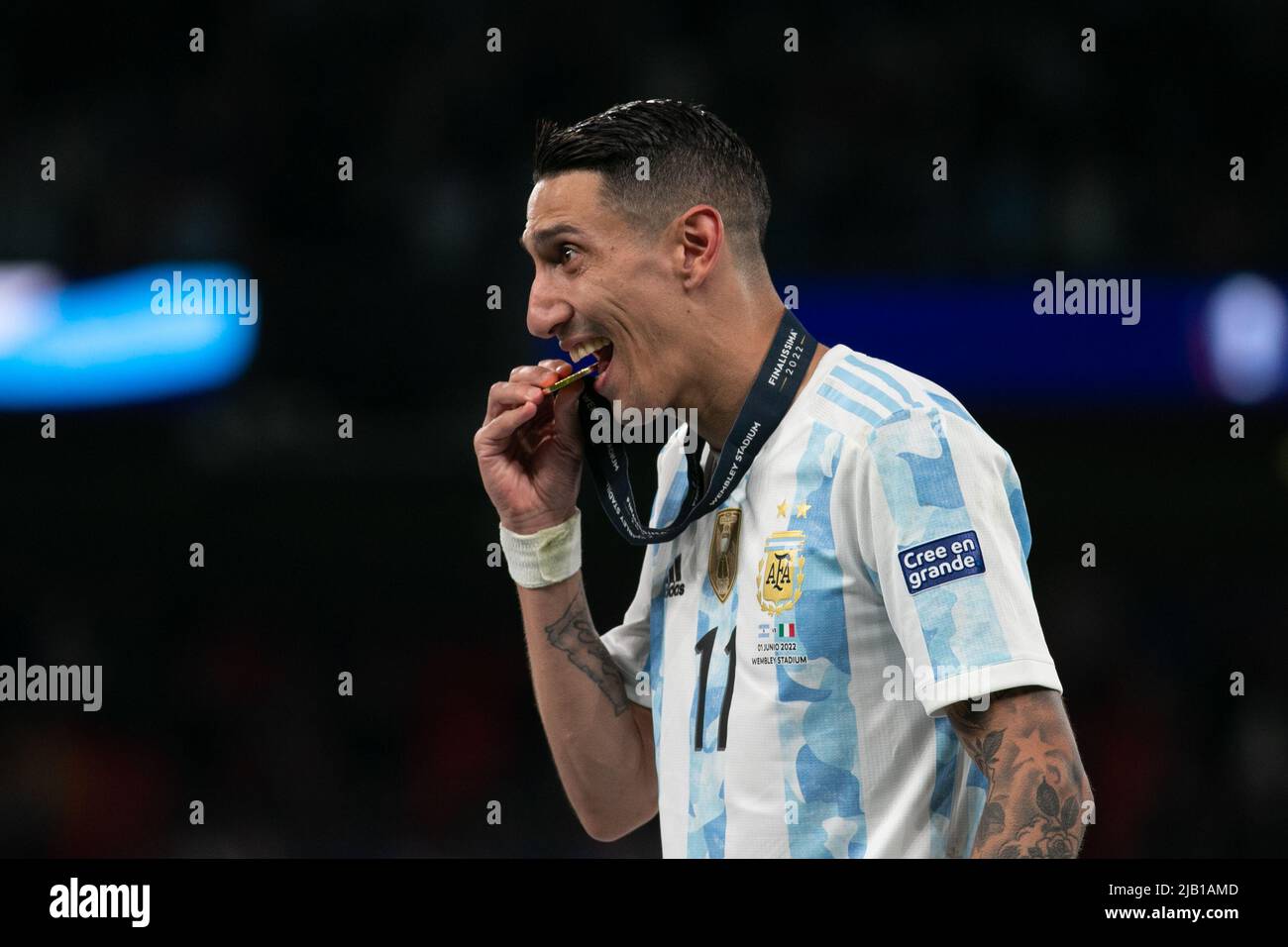 Angel Di María of Argentina bites the medal after the Italy v Argentina - Finalissima 2022 match at Wembley Stadium on June 1, 2022 in London, England. (MB Media) Stock Photo