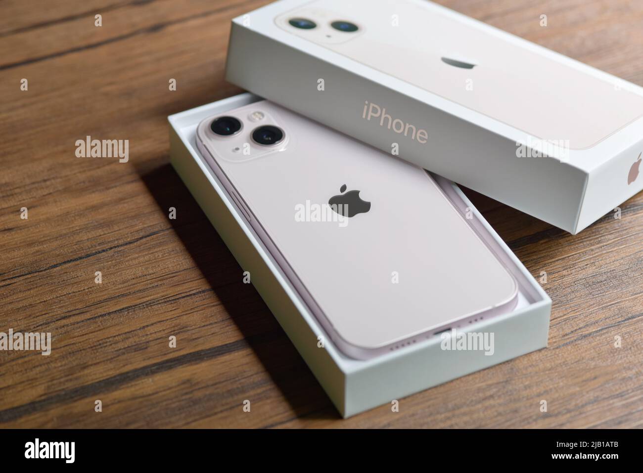 Bangkok Thailand March 25 22 Close Up Of The New Iphone 13 Pink Color On Wood Background With Box Soft Selected Focus Stock Photo Alamy