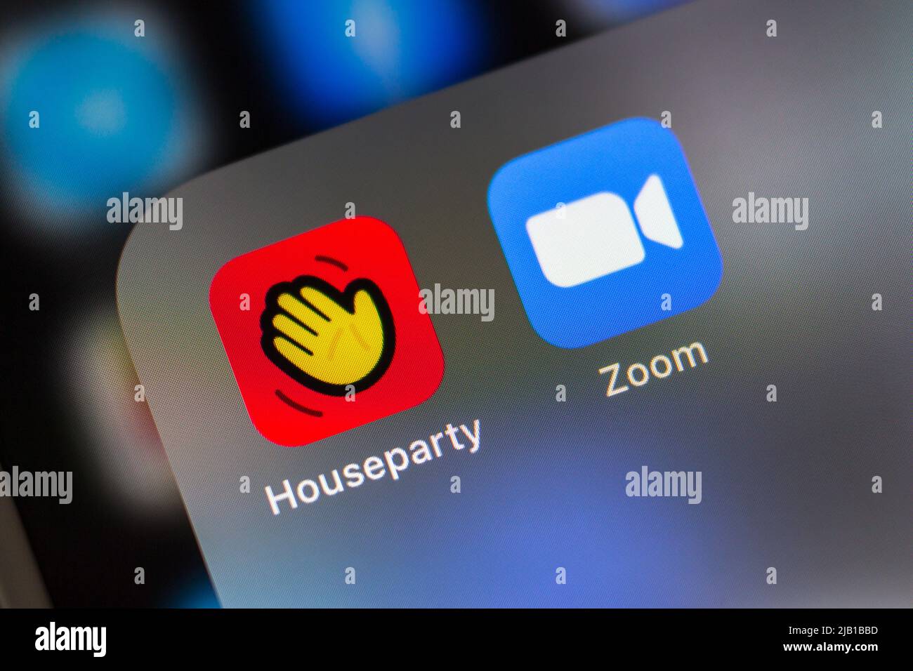 Kumamoto, JAPAN - Feb 15 2021 : Houseparty app with Zoom app on iPhone. Houseparty is a social networking service that enables group video chatting Stock Photo
