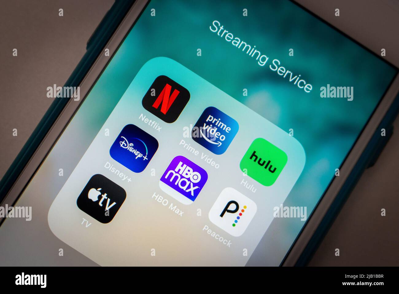 Kumamoto, JAPAN - Feb 15 2021 : Popular streaming service icons (Netflix, Prime Video, Hulu, Disney plus, HBO Max, Peacock & Apple TV plus) on iPhone Stock Photo