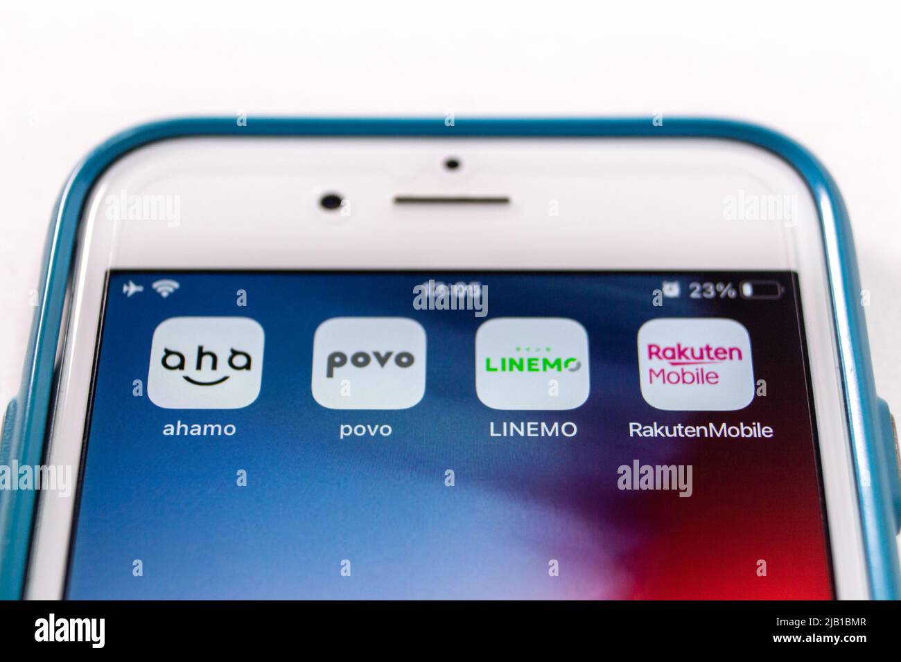 Kumamoto, JAPAN - Mar 18 2021 : Ahamo, povo, LINEMO & Rakuten Mobile icons on iPhone. From Mar 2021, Japan’s big 3 mobile providers start cheaper plan Stock Photo