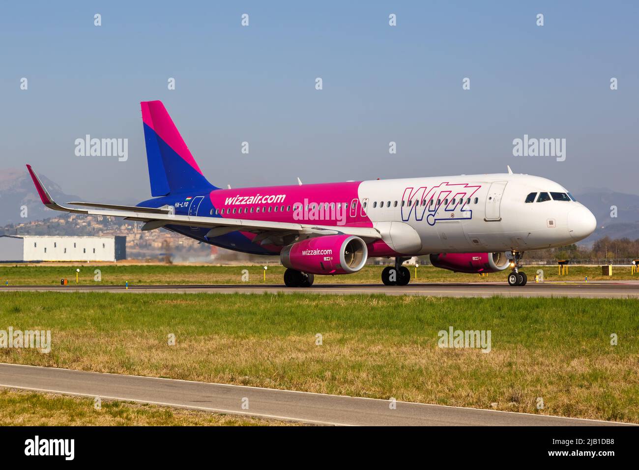 Bergamo, Italy - March 25, 2022: Wizzair Airbus A320 airplane at Bergamo airport (BGY) in Italy. Stock Photo