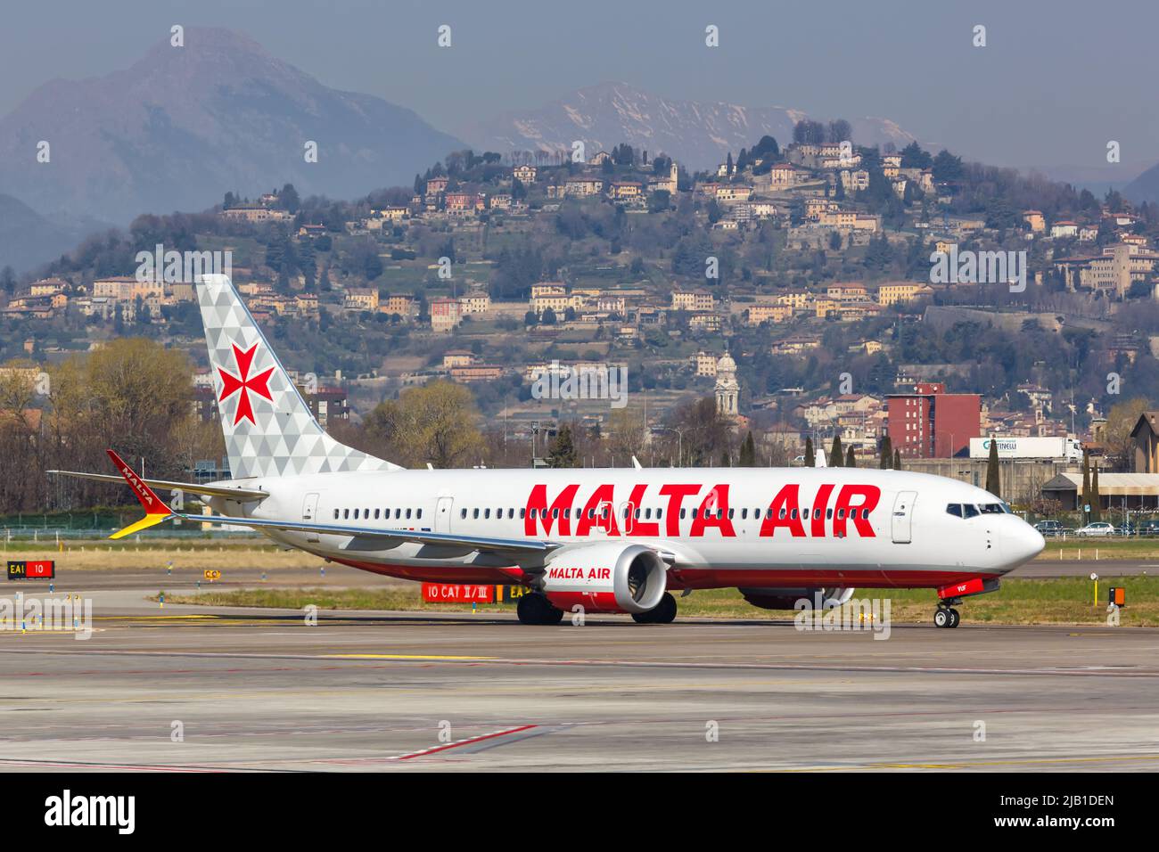 Bergamo, Italy - March 23, 2022: Malta Air Boeing 737-8-200 MAX airplane at Bergamo airport (BGY) in Italy. Stock Photo