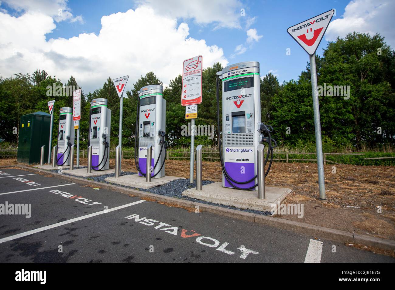 Insta Volt headquartered in Basingstoke, UK, InstaVolt is an operator and owner of electric vehicle (EV) charge points with a nationwide network across the UK. The Company was founded in 2016 and is built on a strong vision to enable the UK’s journey to net zero through mass adoption of EVs. As a third of British households lack access to off-street charging, many rely on public charging stations. InstaVolt’s mission-critical nationwide network of reliable charge points offers secure charging for EV owners to depend on. Charging units near Thirsk, North Yorkshire, on the A19. Stock Photo
