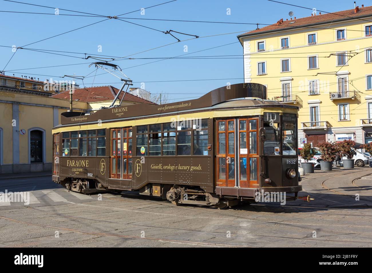 Milan, Italy - March 23, 2022: Old tram Ventotto type Milano public transport transit transportation traffic at Stazione Genova station in Milan, Ital Stock Photo