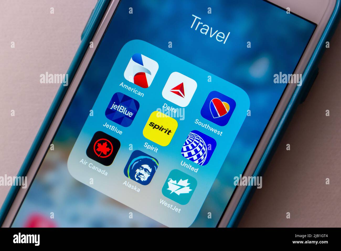 US airline icons on iPhone (American Airlines, Delta, Southwest, United Airlines, Air Canada, Alaska Airlines, JetBlue Airways, Spirit and WestJet). Stock Photo
