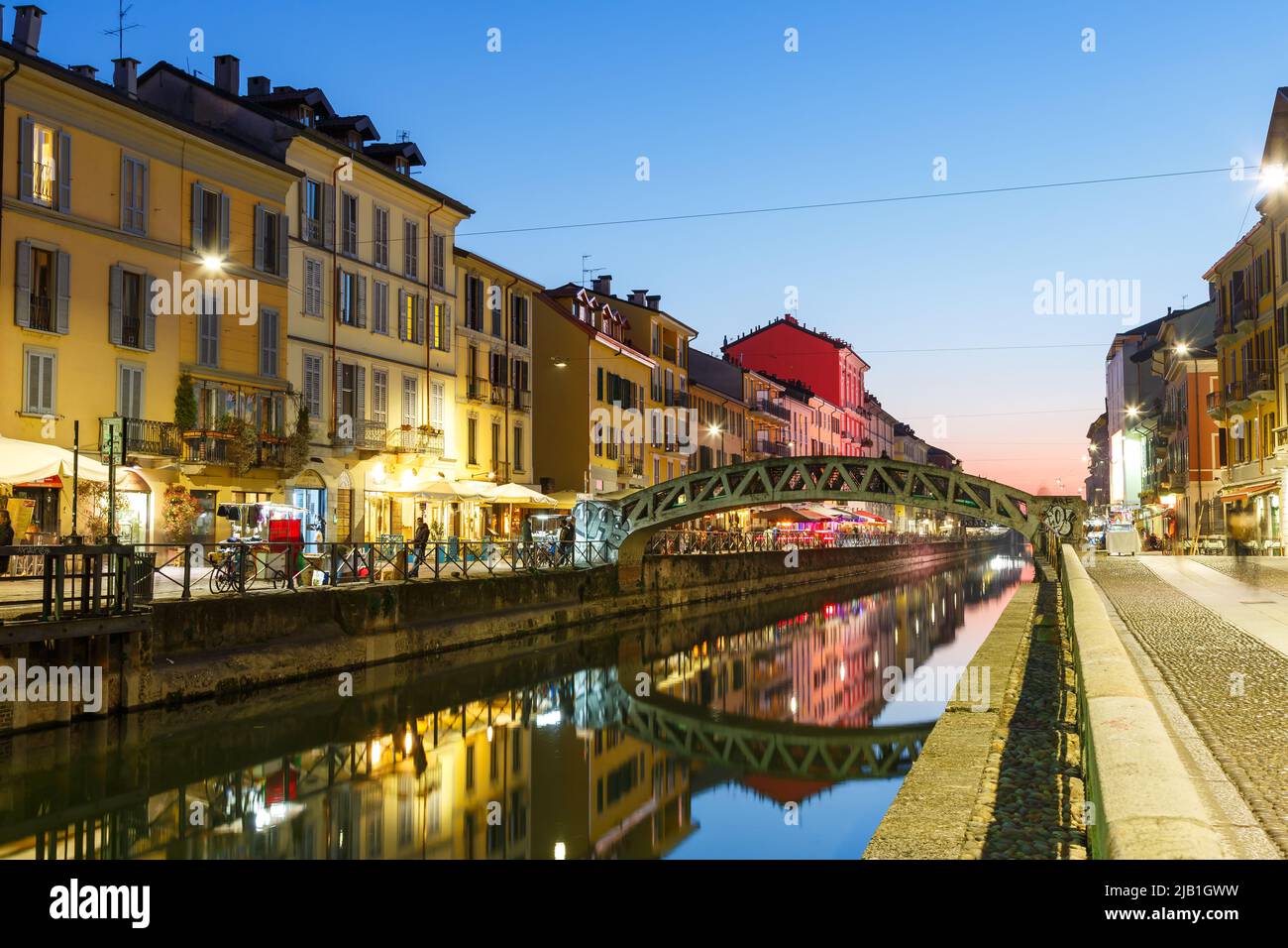 Milan Navigli Milano restaurant and bar district travel traveling holidays vacation town city blue hour in Italy Stock Photo