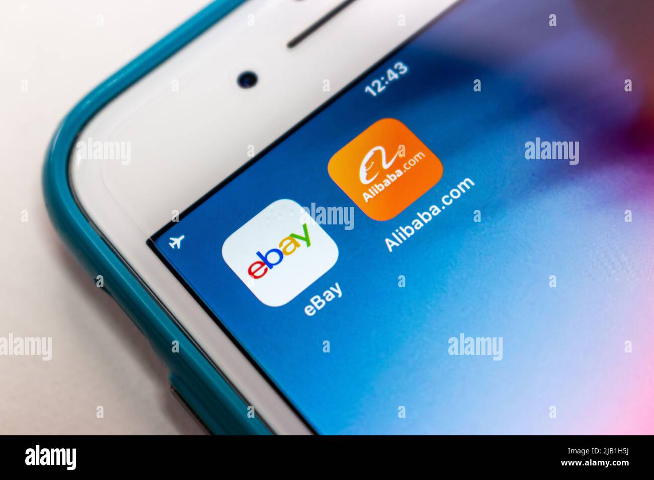 eBay and Alibaba apps on iPhone. eBay Inc. is an US multinational e-commerce corporation. Alibaba.com is an online B2B marketplace by Alibaba Group Stock Photo