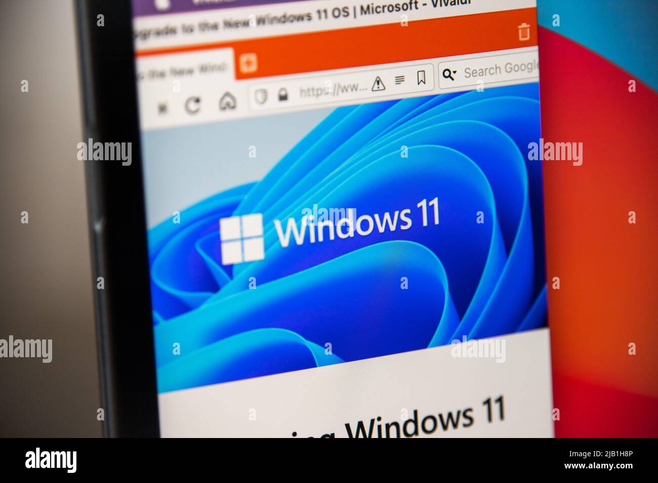 Kumamoto, JAPAN - Jun 25 2021 : Logo of Windows 11 (major release of NT operating system by Microsoft) displays in the official website on laptop Stock Photo