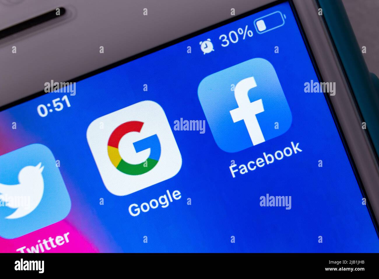 Kumamoto, JAPAN - Jul 12 2021 : Closeup Google and Facebook apps on iPhone screen. US big tech mobile app concept Stock Photo