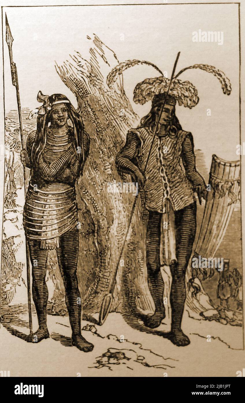 A 19th century engraving of male and female Dayaks  (also known as Dyaks, Dajaks and Dayuh ) natives from Borneo. Though a distinctive group, the hill-dwelling ethnic tribes  each have their own culture, dialect, customs, territory, and  laws.  ---  Ukiran abad ke-19 Dayaks lelaki dan perempuan (juga dikenali sebagai Dyaks, Dajaks dan Dayuh ) asli dari Borneo.  ----   Ukiran suku Dayak laki-laki dan perempuan abad ke-19 (juga dikenal sebagai Dyaks, Dajaks dan Dayuh)  penduduk asli dari Kalimantan. Stock Photo
