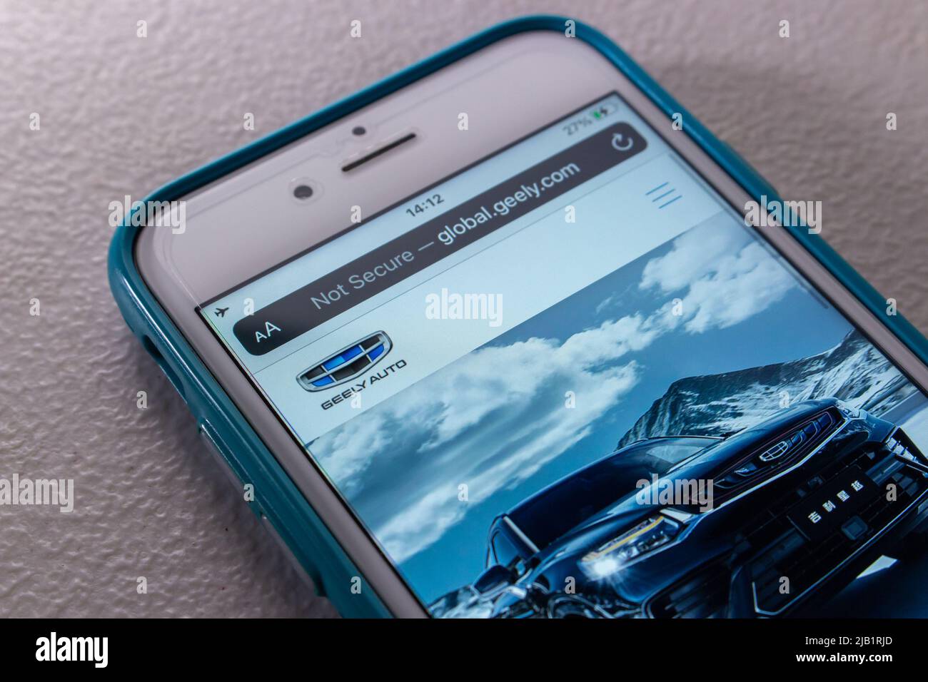 Kumamoto, JAPAN - Aug 16 2021 : A Chinese automotive company Geely (Geely Auto brand) website on iPhone screen Stock Photo