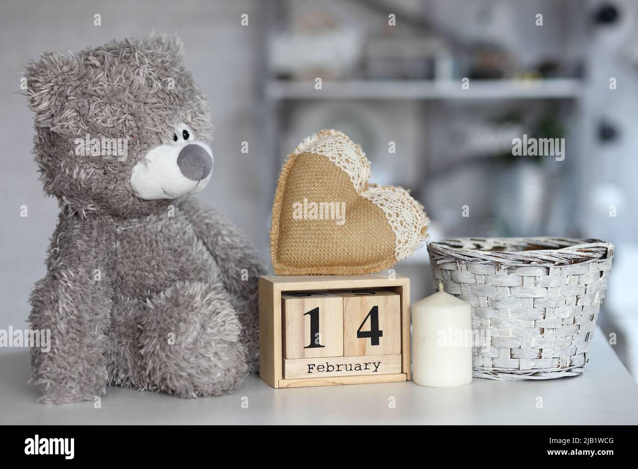 Teddy Bear with heart sitting on wood table, Valentine's day and love ...