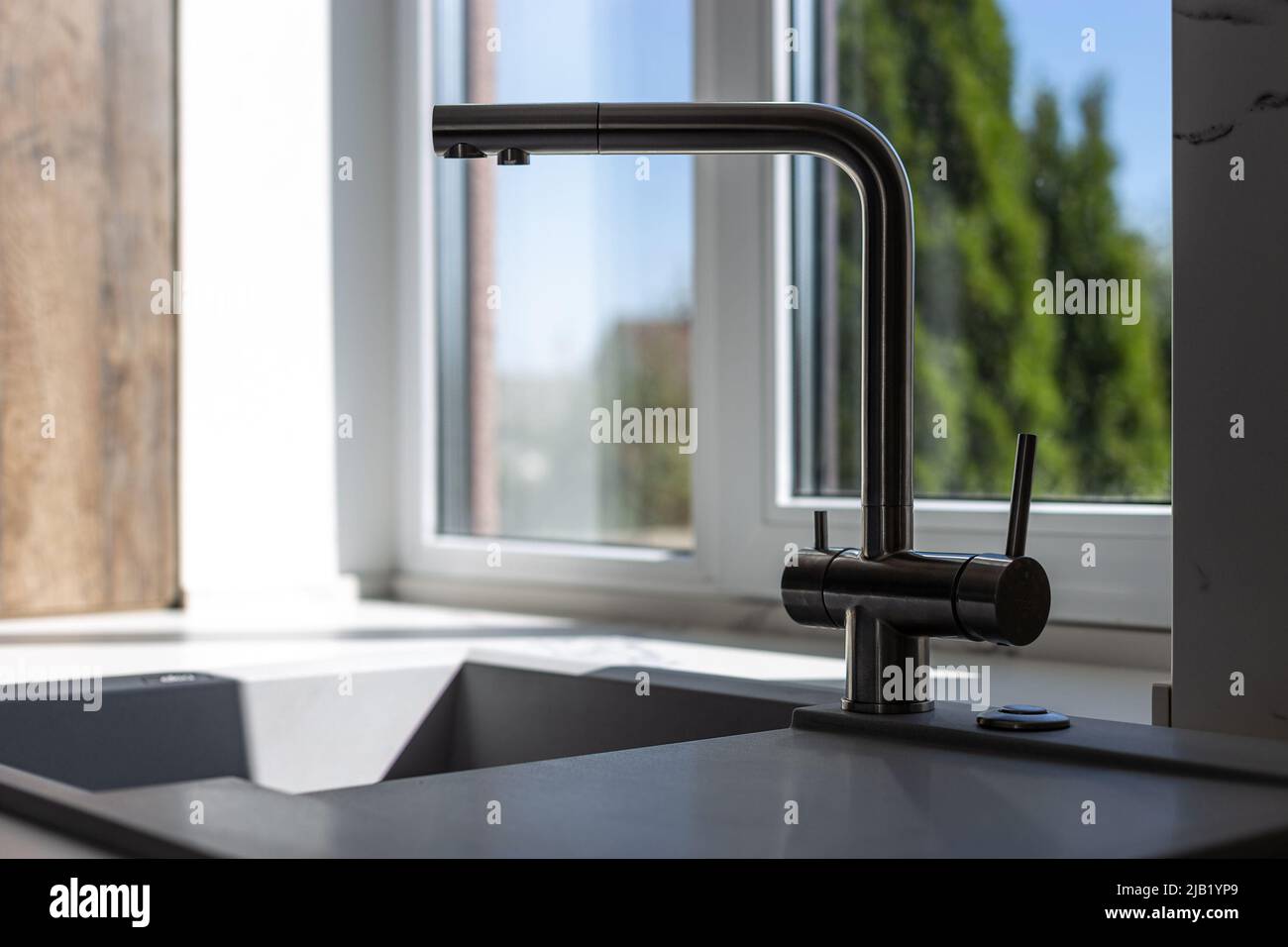 Expensive luxury kitchen sink with faucet Stock Photo Alamy