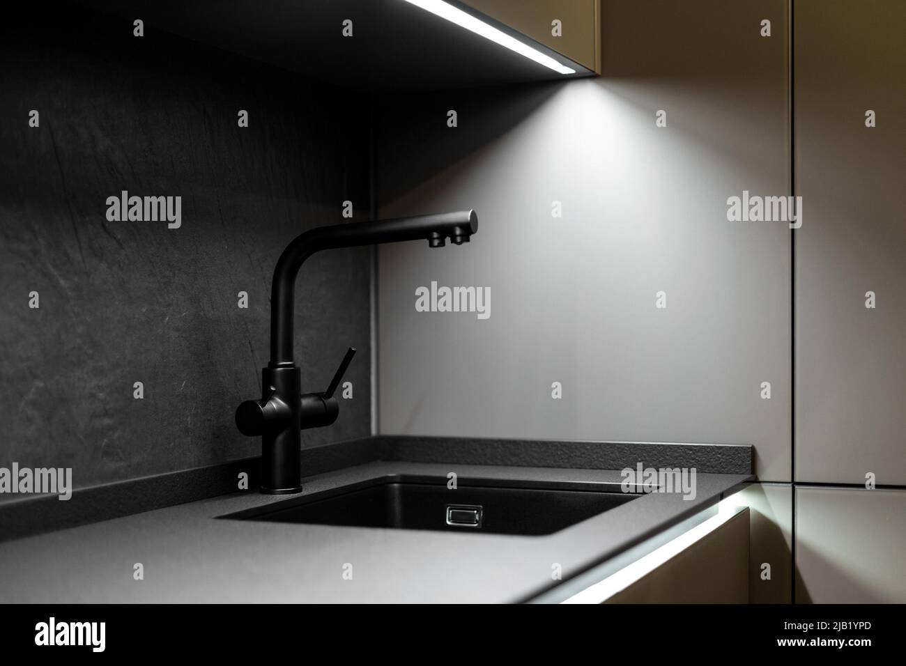 Expensive luxury kitchen sink with faucet Stock Photo
