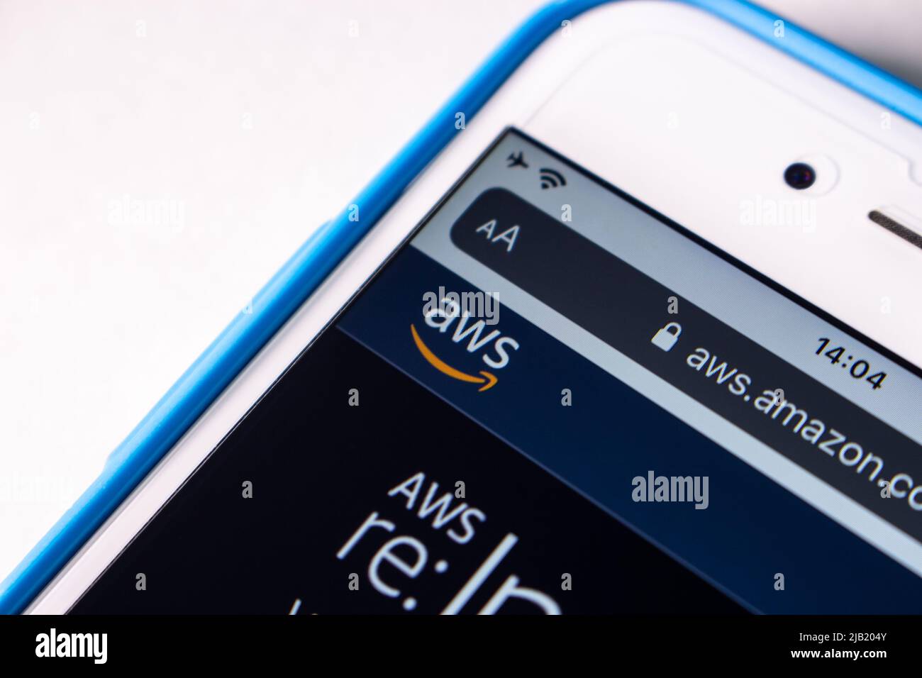 Closeup AWS (Amazon Web Services) logo on its website on iPhone. AWS is a providing on-demand cloud computing platforms and APIs by Amazon Stock Photo