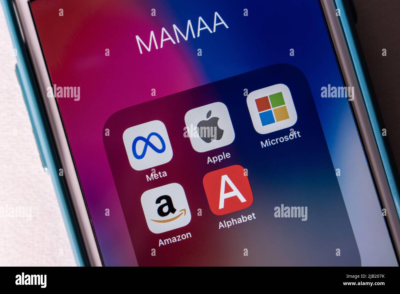 MAMAA, stands for Meta Platforms, Apple, Microsoft, Amazon, & Alphabet inc (Google's parent company), 5 US tech giants in the IT industry, on iPhone. Stock Photo