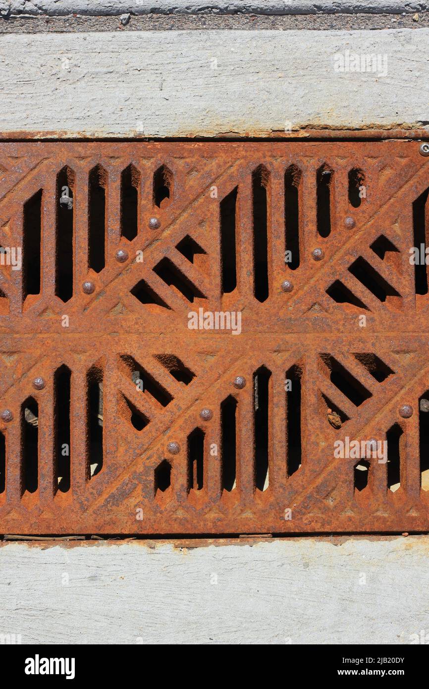 Standard rusty sewer drainage cover Stock Photo - Alamy