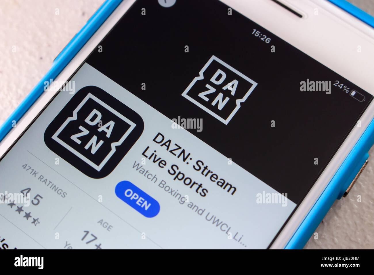 Logo of DAZN, international over-the-top sports (OTT) subscription video streaming service available in over 200 countries, in App Store on iPhone Stock Photo