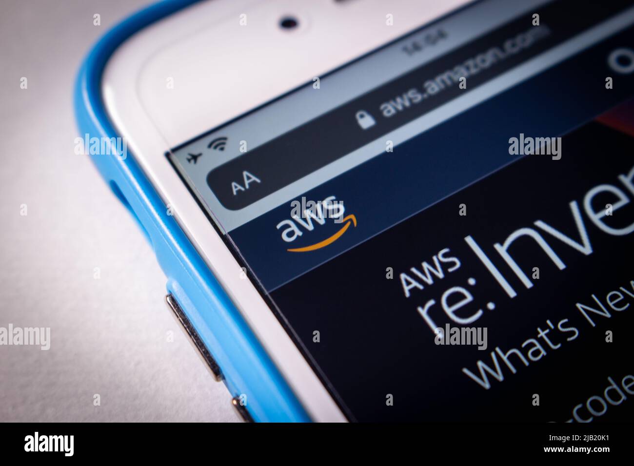 Closeup AWS (Amazon Web Services) logo on its website on iPhone. AWS is a providing on-demand cloud computing platforms and APIs by Amazon Stock Photo