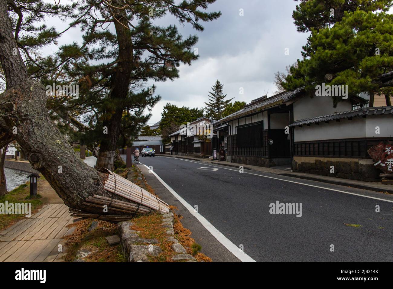 Matsue, Shimane, JAPAN - Dec 1 2021 : The Shiomi Nawate Street in cloudy day. It is a 500 meters long street along the Matsue castle moat that is line Stock Photo