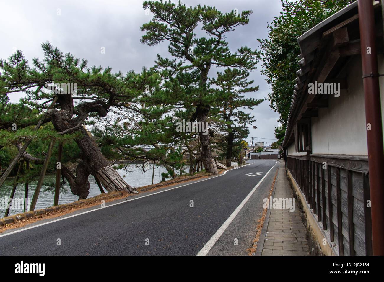 The Shiomi Nawate Street in cloudy day, Matsue, Shimane, Japan. It is a 500 meters long street along the Matsue castle moat that is lined with traditi Stock Photo