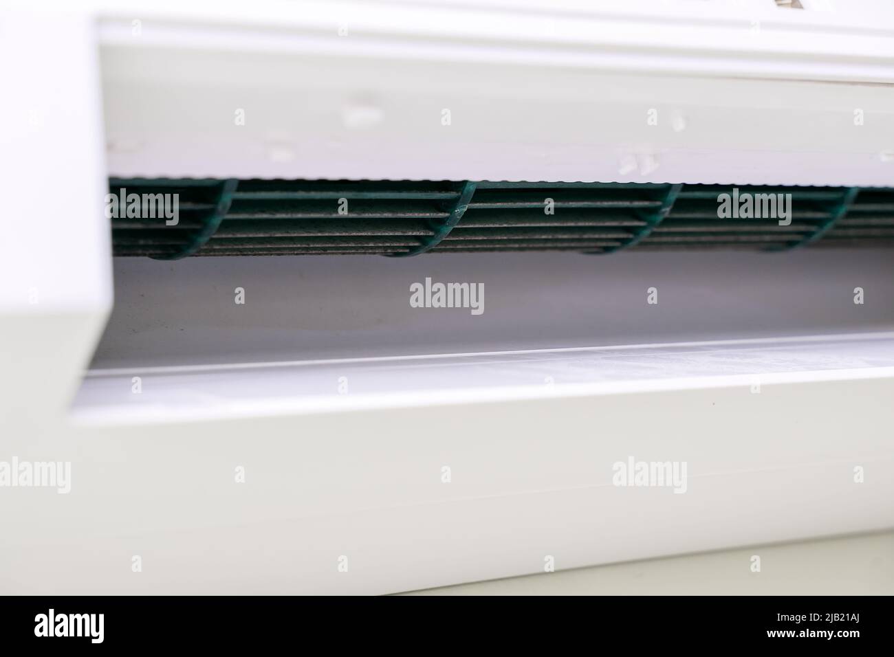 dirty ceiling air conditioner cooler closeup. Stock Photo