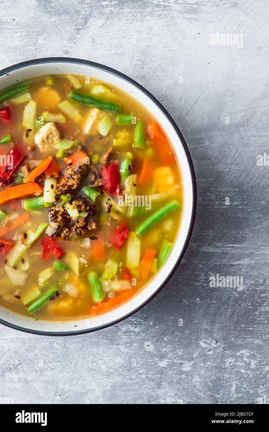 vegan asian vegetable soup with mixed vegtable and soy protein, healthy