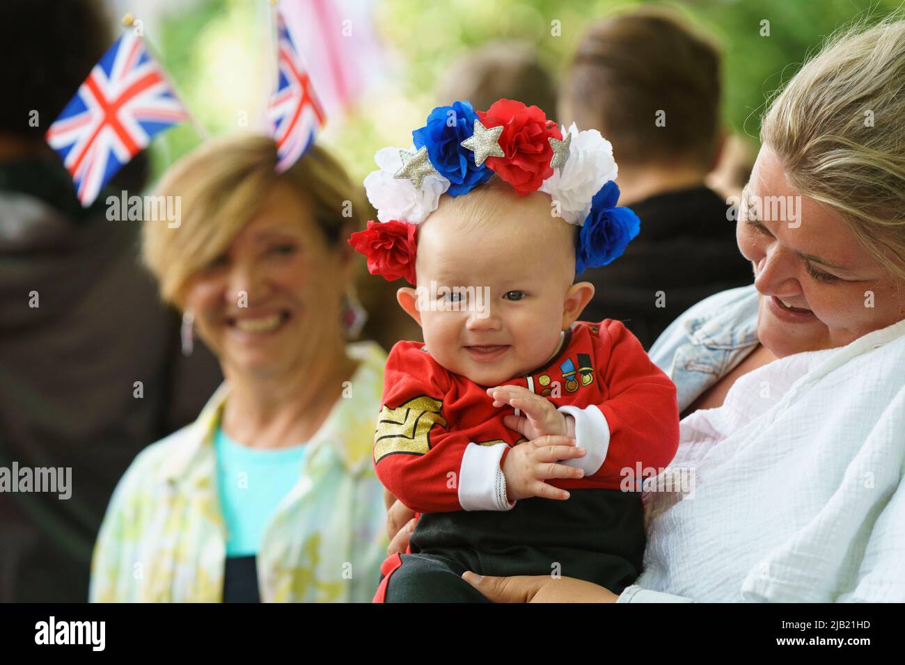 London, UK. 2nd June 2022. LONDON - JUNE 2: Four month old Ernie from Hemel Hempstead in his guardsman uniform watches the Trooping the Colour ceremony on June 2, 2022 in central London. Photo by David Levenson Credit: David Levenson/Alamy Live News Stock Photo